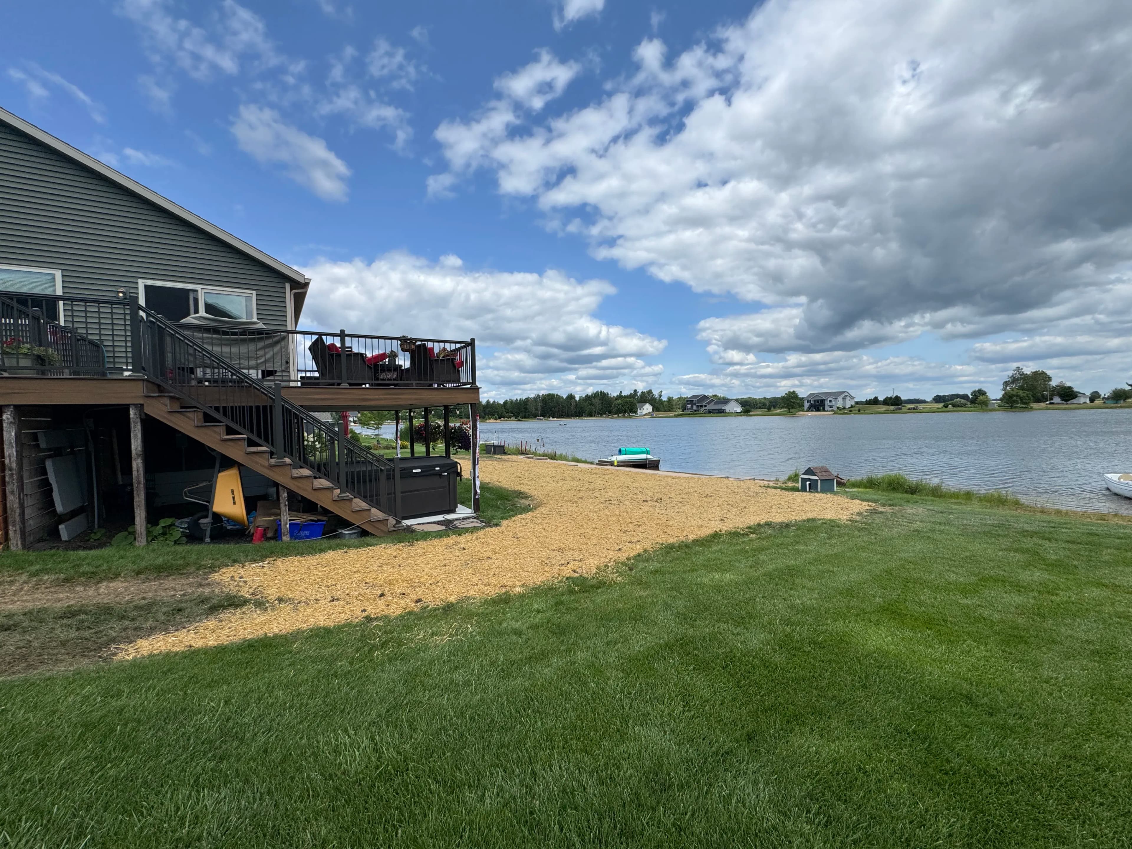 Project Custom Retaining Wall Keeps Beach Sand Out of the Lake image