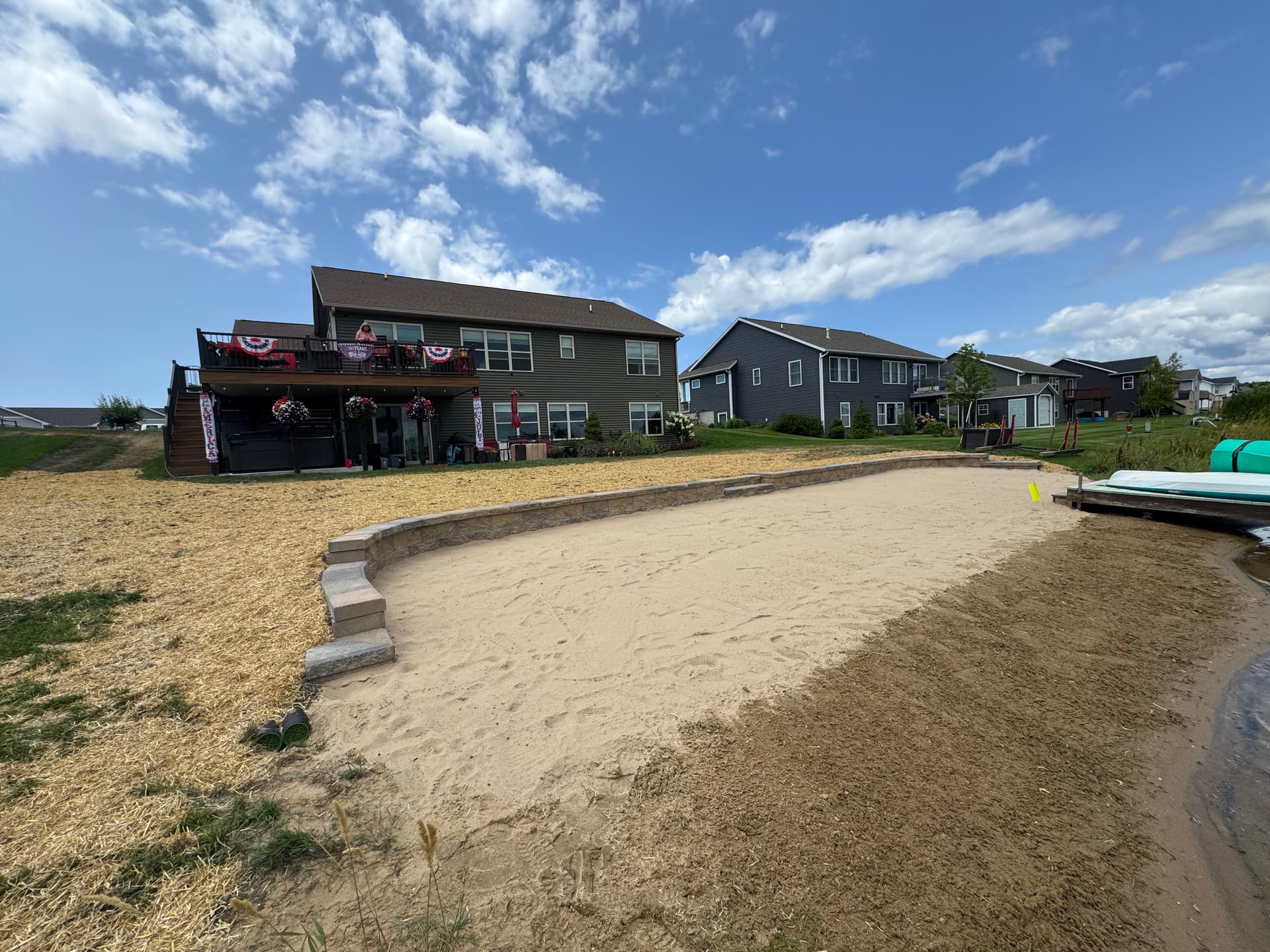 Gallery photos for Custom Retaining Wall Keeps Beach Sand Out of the Lake: Image #1