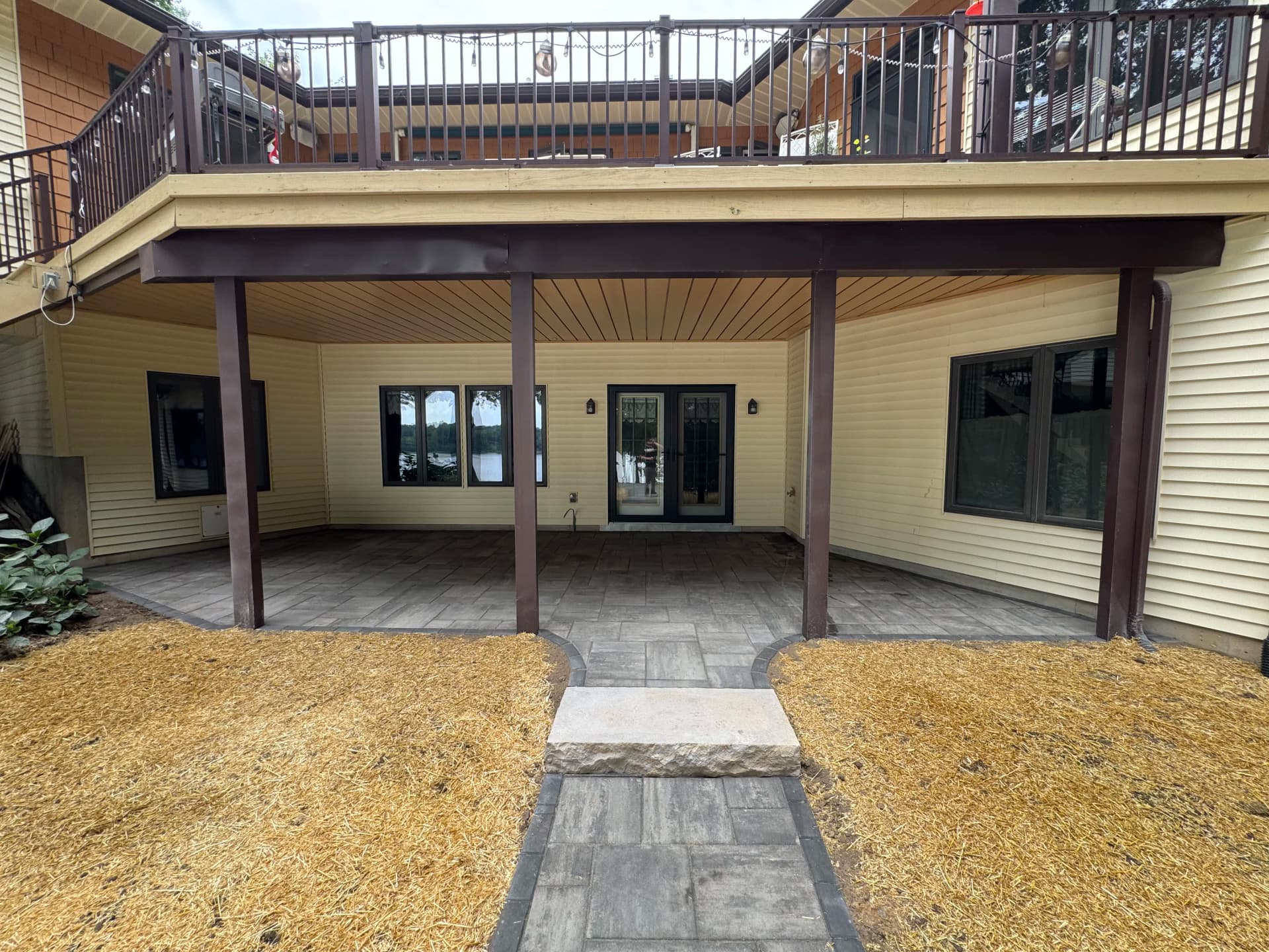 Gallery photos for 760 Sq Ft Paver Patio and Walkway Built on a Sloped Lakefront Yard: Image #2