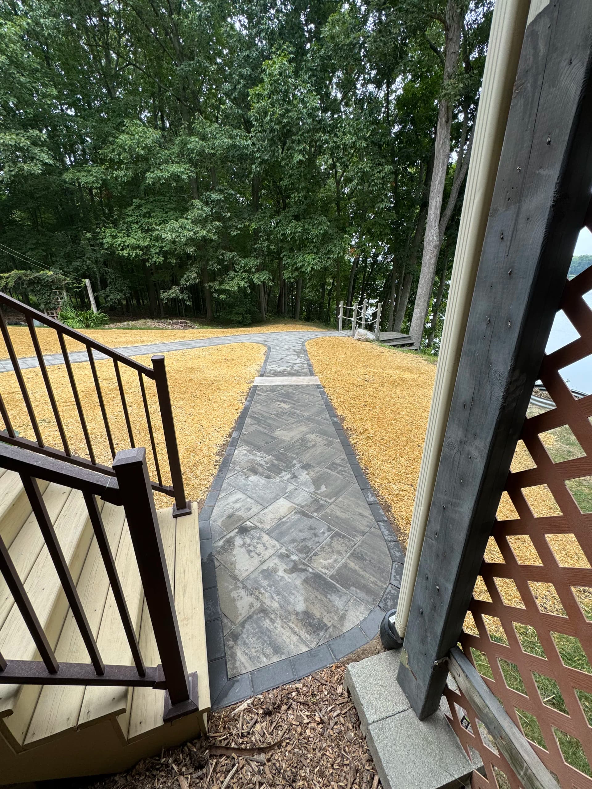 Gallery photos for 760 Sq Ft Paver Patio and Walkway Built on a Sloped Lakefront Yard: Image #1